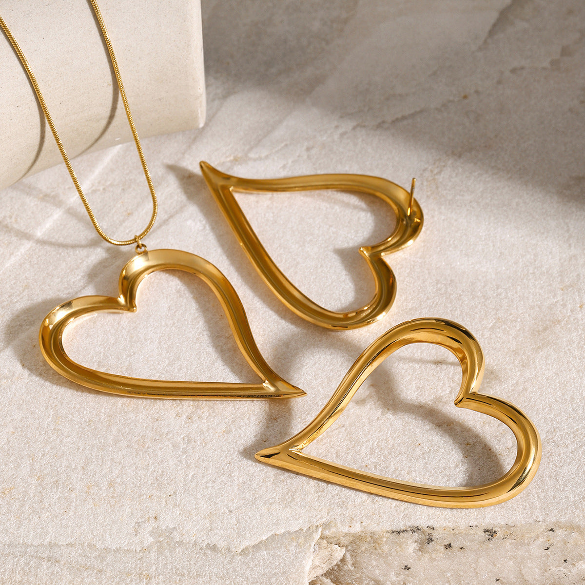 Title optimization:
"Stunning Twisted Heart Line Earrings with 18K Gold Plating and Stainless Steel Construction"